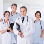 Male Doctor In Front Of Team