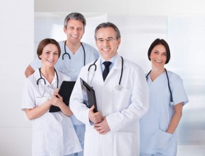 Male Doctor In Front Of Team