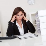 Overworked Businesswoman In Office