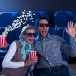 Couple reacting in shock to a 3D movie